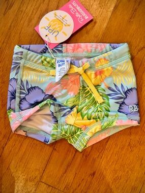 NWT Ruffle Butts Aloha Blossoms Swim Shorties with Yellow Drawstring
